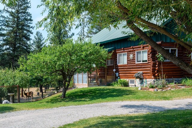5899 Black Lake Rd, Rexford, MT 59930 - view of home's exterior with a lawn and log exterior
