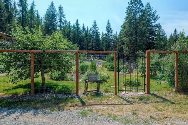 5899 Black Lake Rd, Rexford, MT 59930 - view of gate featuring a garden
