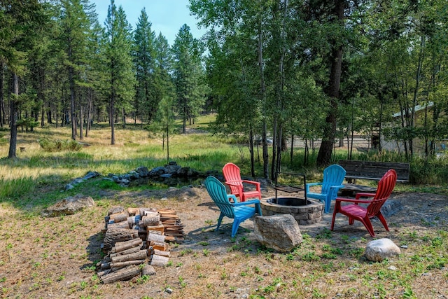 5899 Black Lake Rd, Rexford, MT 59930 - view of yard featuring a fire pit