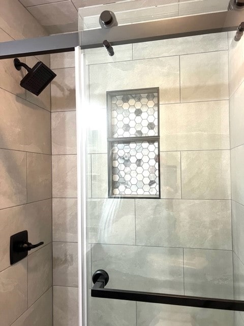 bathroom featuring walk in shower