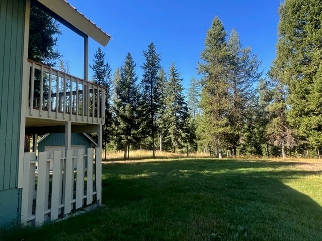 view of yard with a deck