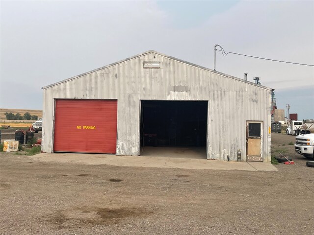 view of outbuilding featuring a garage