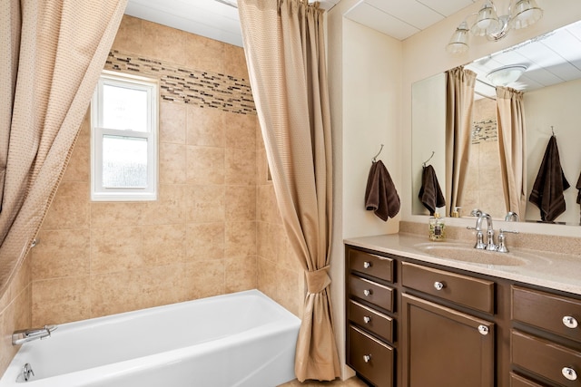 bathroom featuring vanity and shower / bath combo