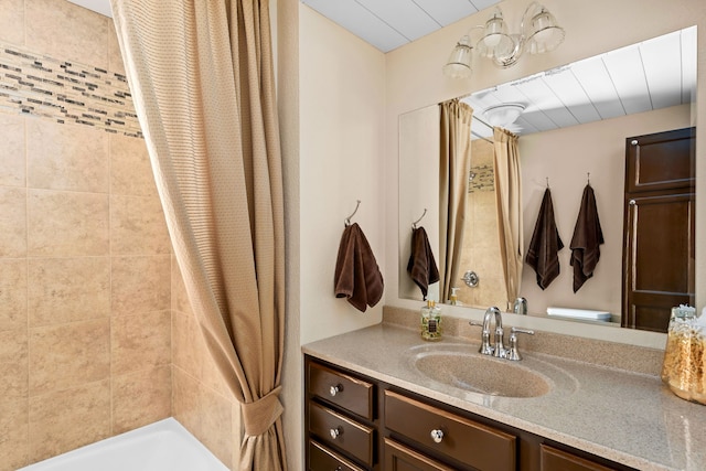 bathroom with a shower with curtain, vanity, and toilet