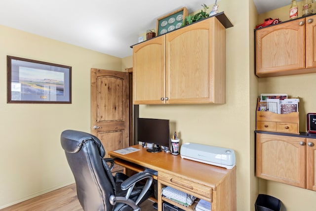 office area with light hardwood / wood-style flooring