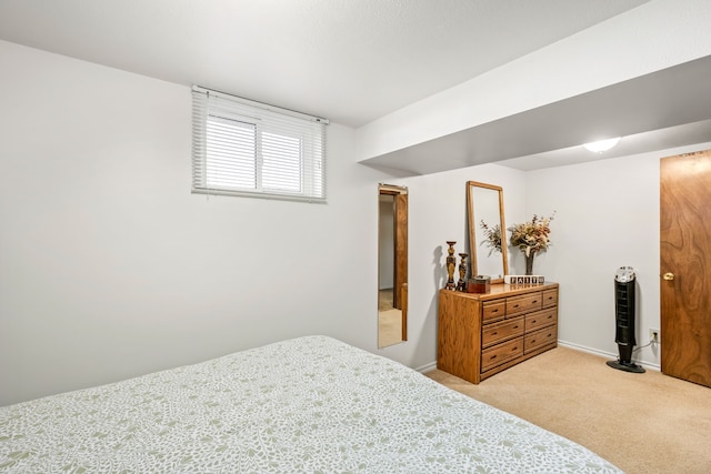 bedroom with light carpet