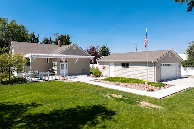 view of front of house featuring a garage, a pergola, a patio area, and a front lawn