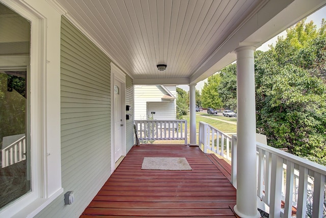 wooden deck featuring a porch