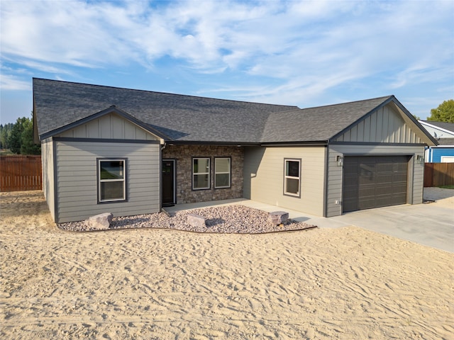 ranch-style home with a garage