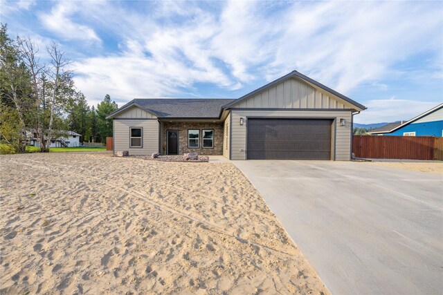 view of front of property with a garage