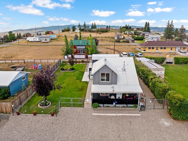 drone / aerial view featuring a mountain view