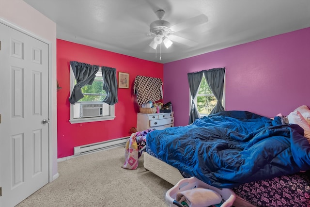 carpeted bedroom featuring a baseboard radiator, cooling unit, ceiling fan, and multiple windows