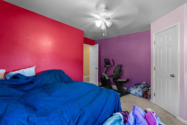 carpeted bedroom with ceiling fan