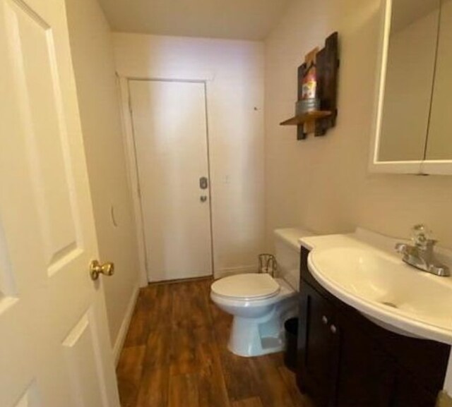 4 Lake Dr, Heron, MT 59844 - bathroom with wood finished floors, vanity, and toilet