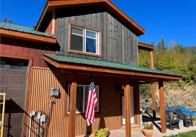 4 Lake Dr, Heron, MT 59844 - view of side of home featuring metal roof