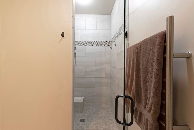 bathroom featuring an enclosed shower