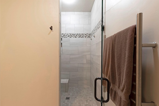 full bathroom featuring a stall shower