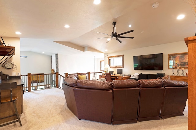 living room featuring ceiling fan, vaulted ceiling, and light colored carpet