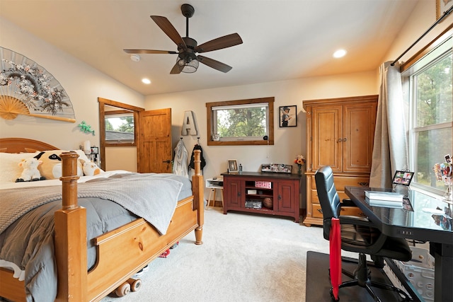 bedroom featuring ceiling fan and light carpet