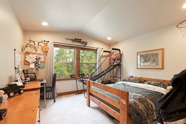 carpeted bedroom featuring vaulted ceiling