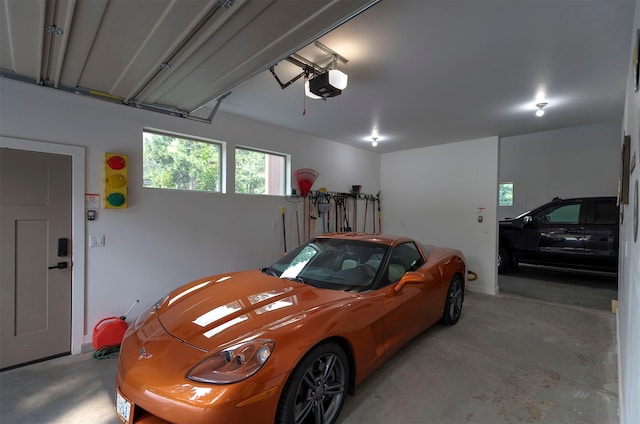 garage featuring a garage door opener