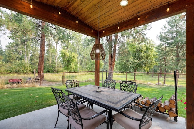 view of patio with a fenced backyard and outdoor dining space