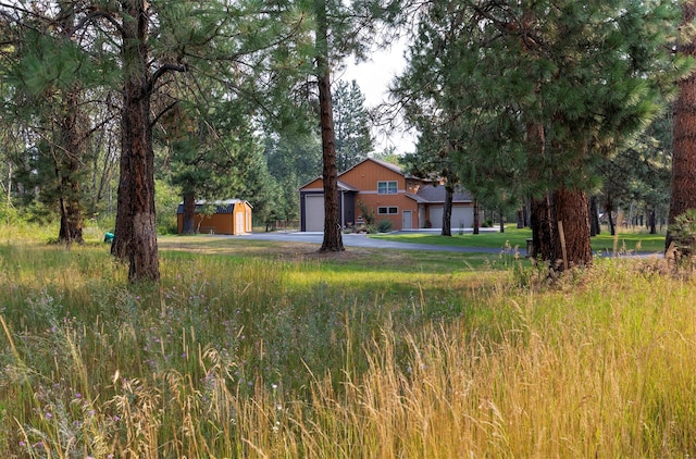 view of yard featuring a garage