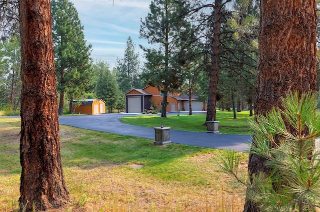 view of yard with a garage