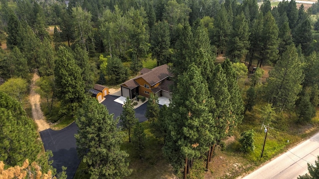 aerial view with a wooded view