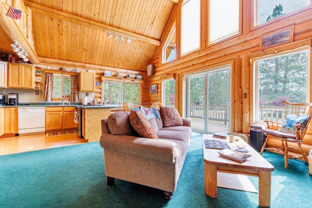 living room with wood-type flooring, wooden ceiling, a healthy amount of sunlight, and high vaulted ceiling