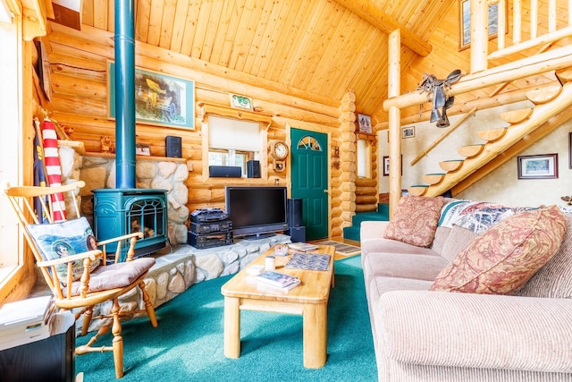 living room with high vaulted ceiling, wood ceiling, carpet floors, a wood stove, and log walls