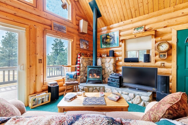 living area featuring carpet floors, a wood stove, log walls, and wood ceiling