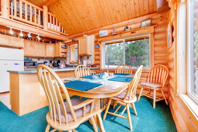 dining room with rustic walls, high vaulted ceiling, carpet floors, and wood ceiling