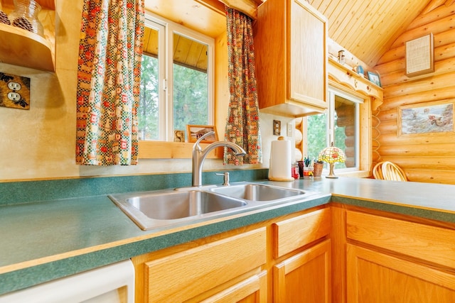 kitchen featuring rustic walls, vaulted ceiling, wooden ceiling, and a sink