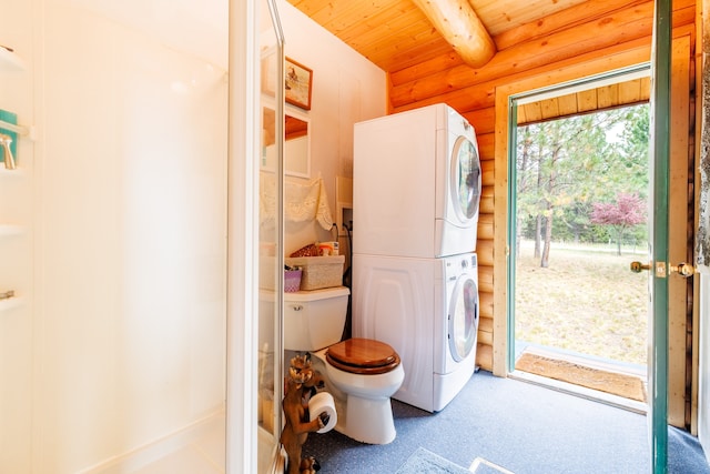 laundry area featuring carpet flooring, stacked washer / dryer, log walls, and wood ceiling