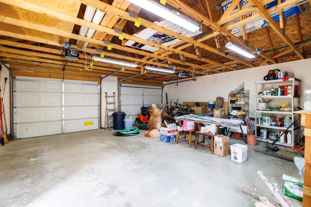 garage featuring a garage door opener