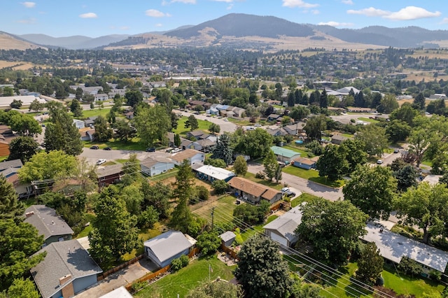 birds eye view of property featuring a mountain view