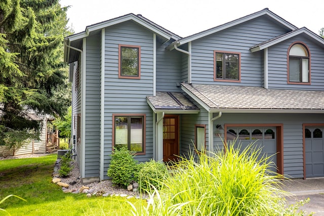 view of front of property featuring a garage