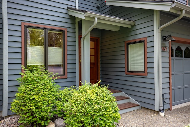 property entrance featuring a garage