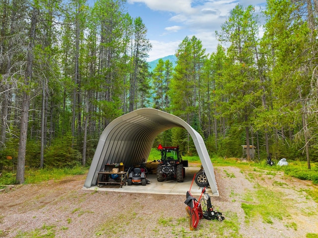 exterior space with a carport