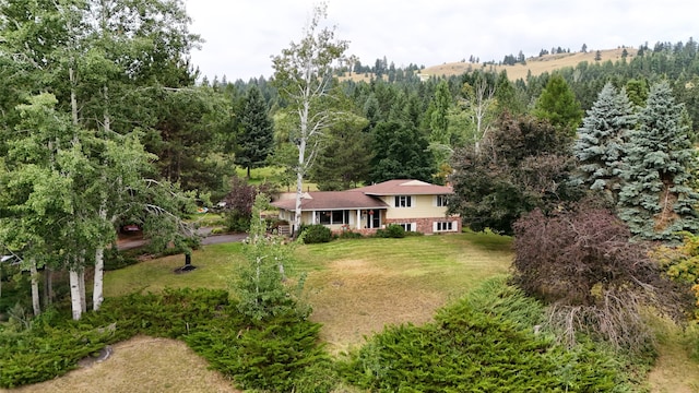 202 Lakeshore Dr, Kalispell, MT 59901 - birds eye view of property featuring a wooded view