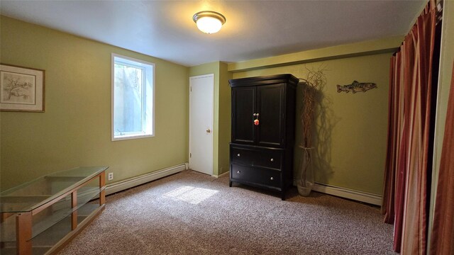 202 Lakeshore Dr, Kalispell, MT 59901 - bedroom featuring baseboard heating and light colored carpet
