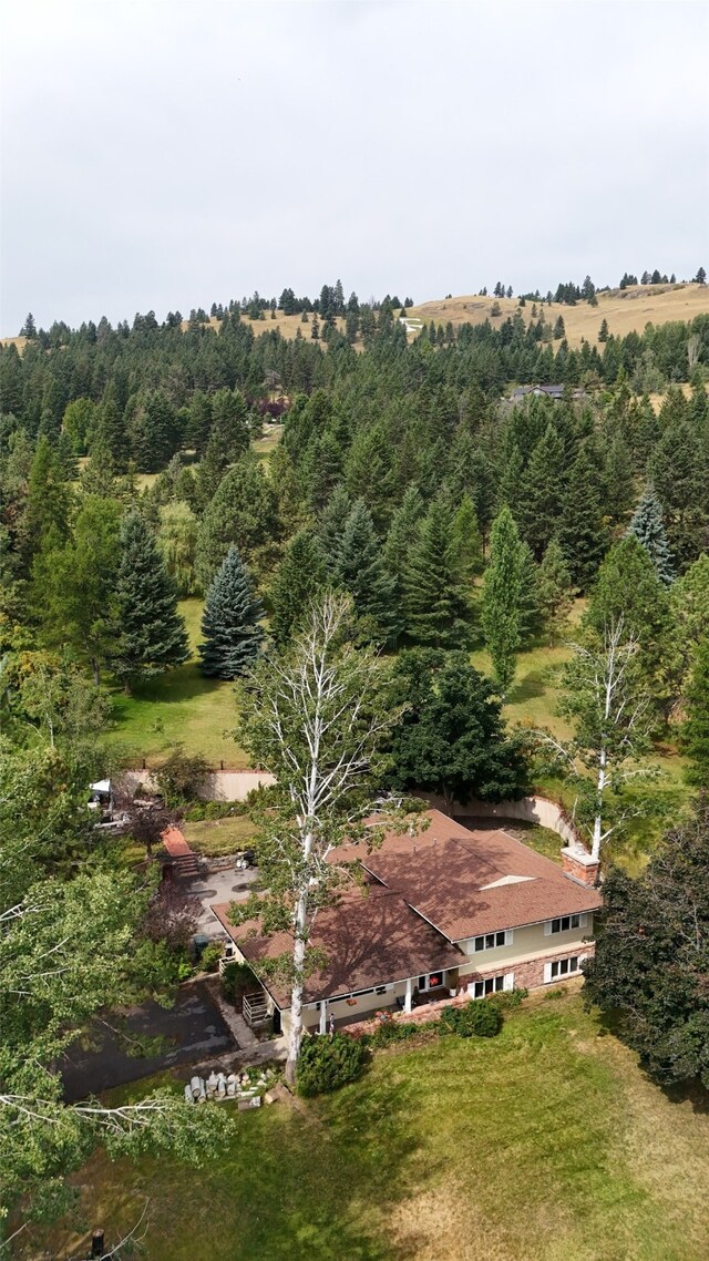 202 Lakeshore Dr, Kalispell, MT 59901 - aerial view featuring a forest view