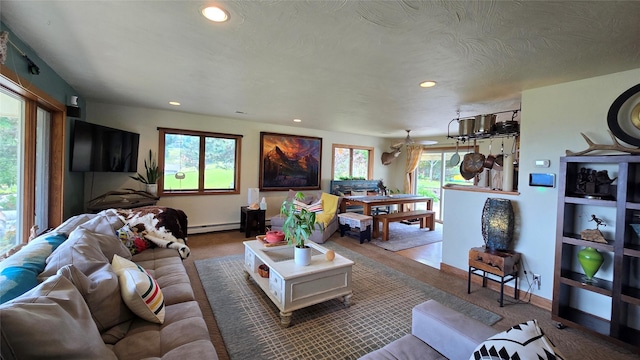 202 Lakeshore Dr, Kalispell, MT 59901 - living room with recessed lighting, baseboards, and a baseboard heating unit
