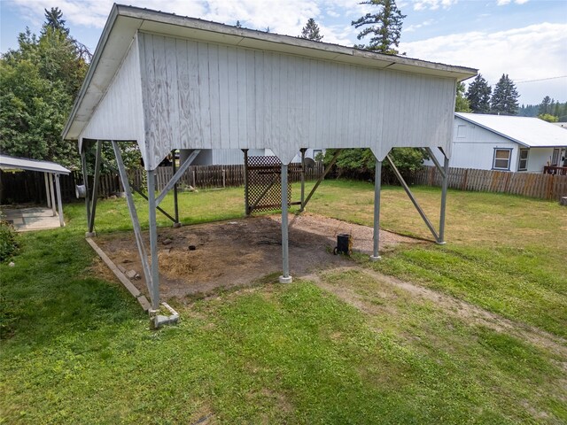 view of outdoor structure with a yard