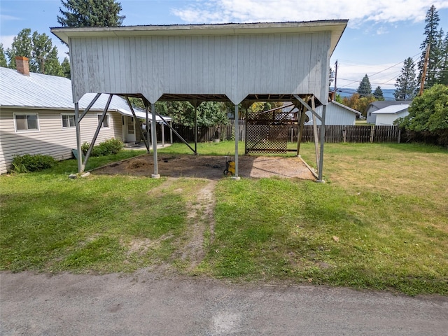 519 W 4th St, Libby, MT 59923 - view of yard with a carport