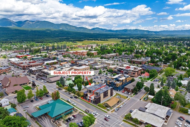 drone / aerial view featuring a mountain view