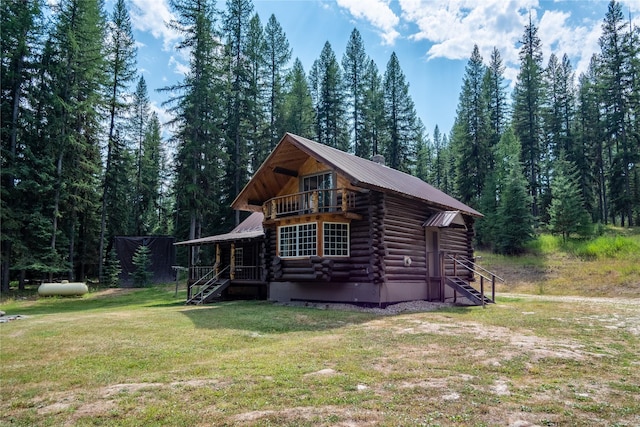 view of outdoor structure featuring a forest view