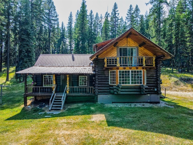 view of yard featuring a fire pit, an outdoor structure, and exterior structure