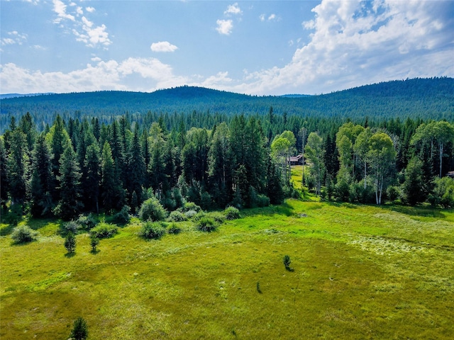 exterior space with a view of trees